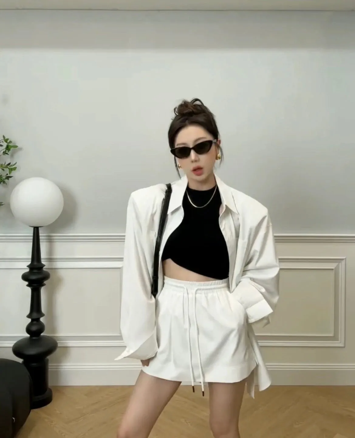 2024 early spring and autumn new Korean lazy style loose long-sleeved solid color sunscreen shirt + short skirt two-piece suit s