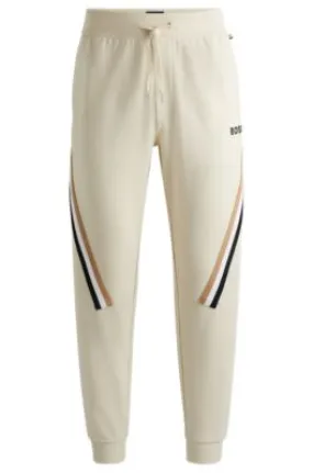 Cotton-terry tracksuit bottoms with signature-stripe tape