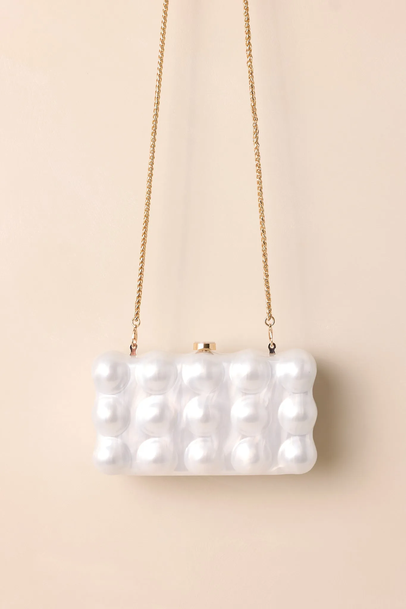 Eclipse’s Whisper Ivory Pearlescent Clutch