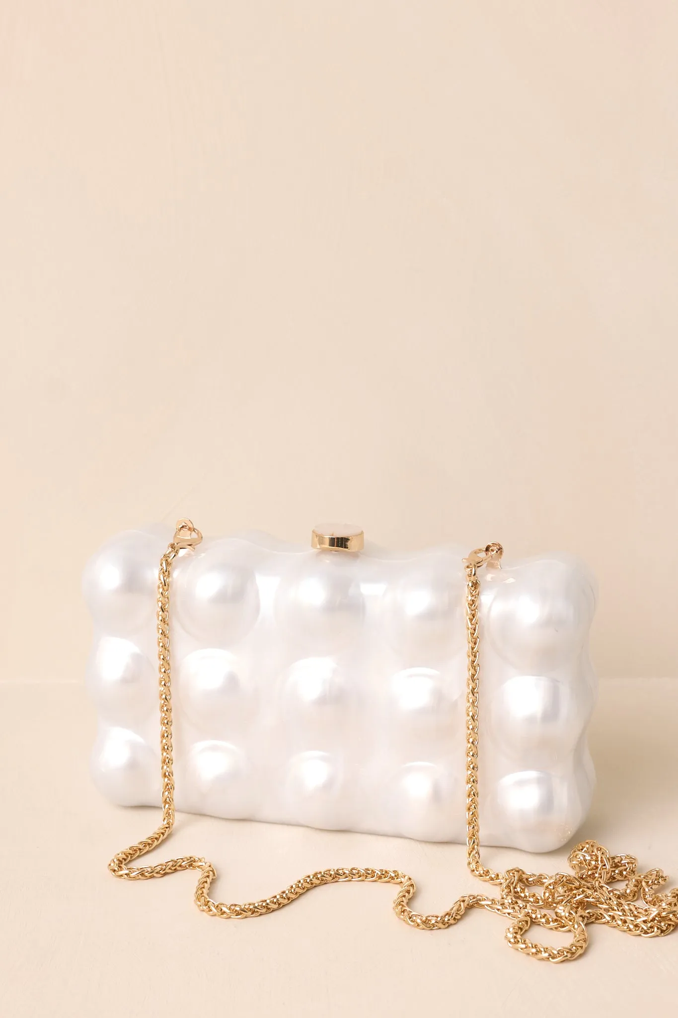 Eclipse’s Whisper Ivory Pearlescent Clutch