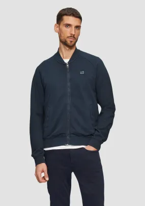Jacket with a garment-dyed effect and raglan sleeves